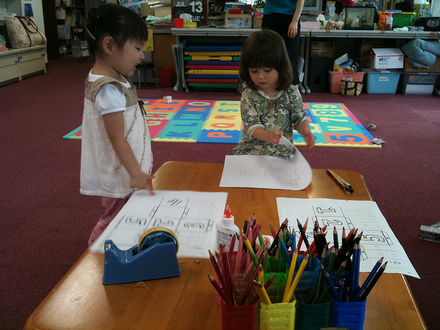 Pre schoolers working on arts and crafts