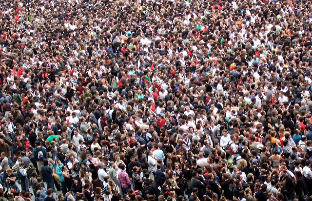 A crowd of people packed into a small space