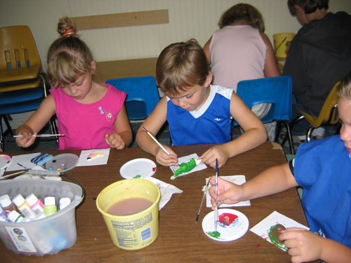 Children painting and making crafts
