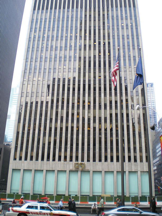 A skyscraper housing the company of Exxon