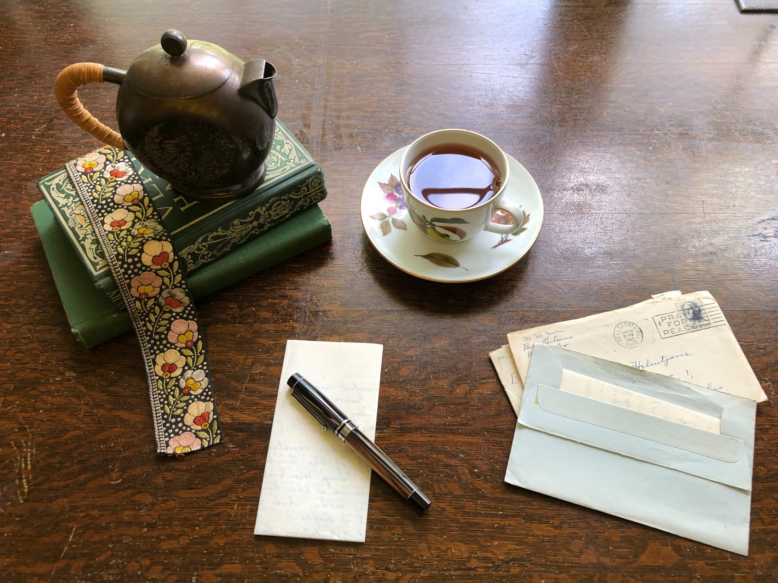 photo of different types writing: books, letters, lists